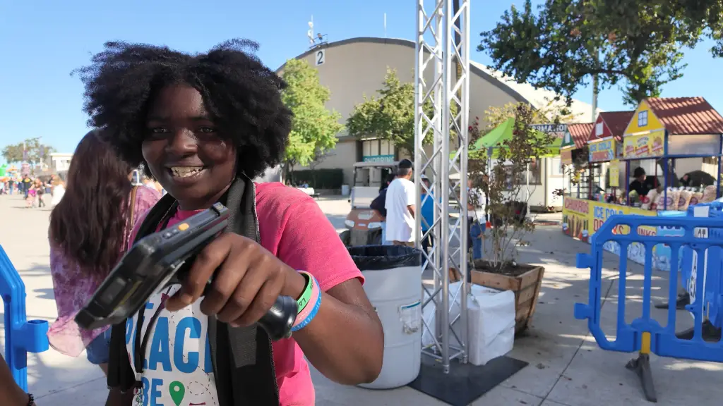 A Kern County Fair Staff Scanning Entry Passes (Photo Credit Cecil Egbele)