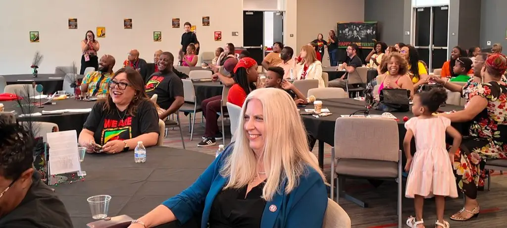 Community members and families share a moment of laughter and fellowship during Bakersfield College’s Juneteenth celebration. The event emphasized connection, kinship and joy. (Photo by Cecil Egbele)
