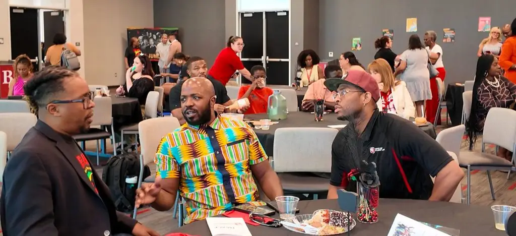 Attendees converse during Bakersfield College’s Juneteenth celebration, where community members gathered for breakfast, reflection and fellowship in recognition of the historic holiday. (Photo by Cecil Egbele)