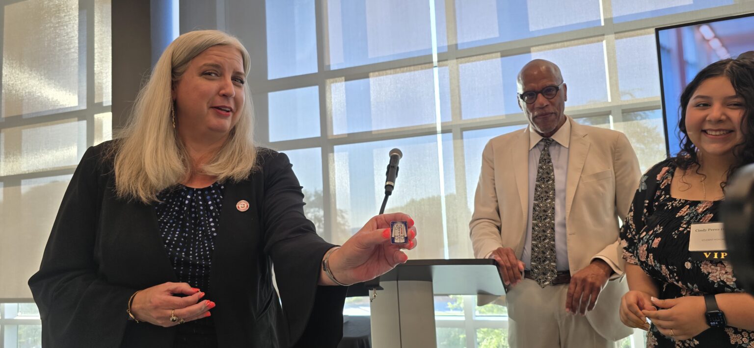 Bakersfield College President, Stacy Pfluger Shows the Look of the Pin (Photo Credit: Cecil Egbele)