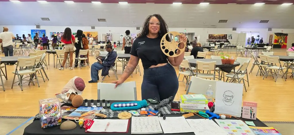 Dani Wallace, a doula shows a dilation tool for pregnant mothers (Photo credit: Cecil Egbele)